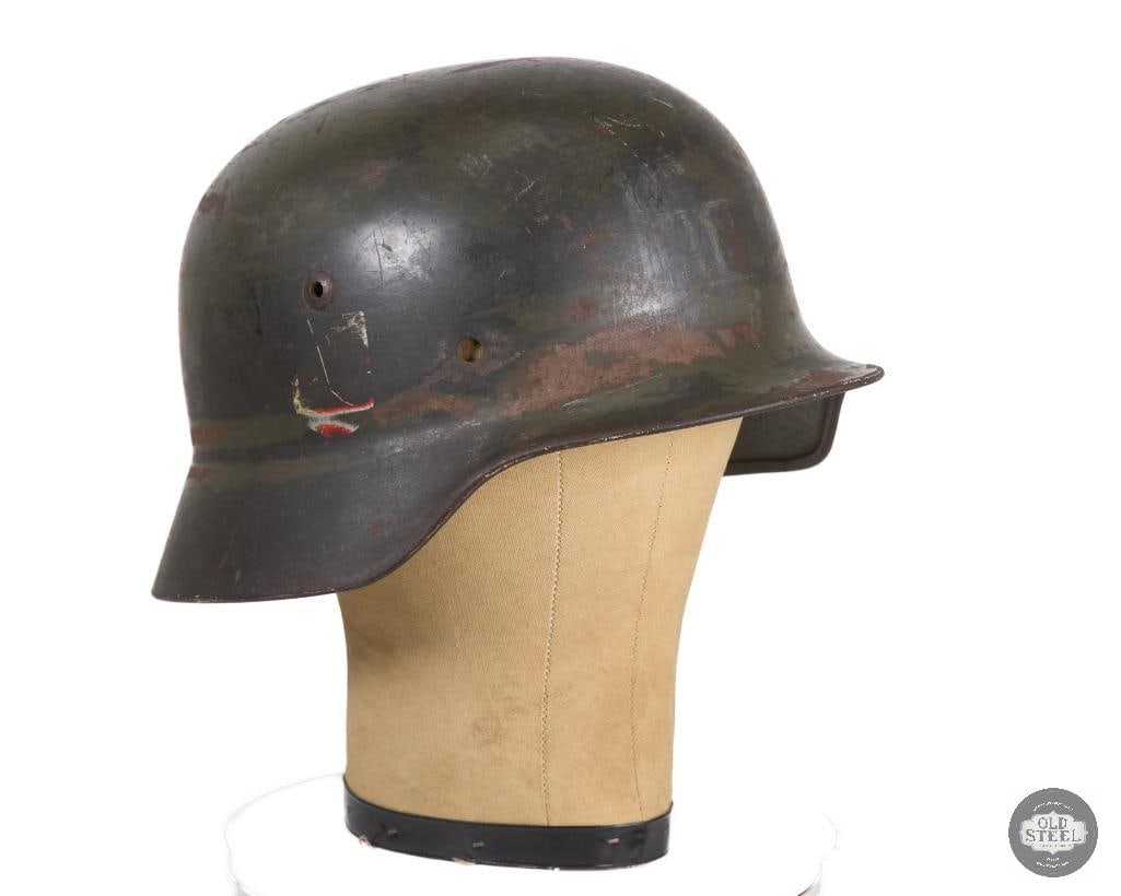 Original M35 German Helmet Shell: M35 helmet shell. Decal is significantly worn away and partially painted over. Markings on inside of shell show lot 312 but the makers mark is faded only showing the 64. THIS ITEM IS AS