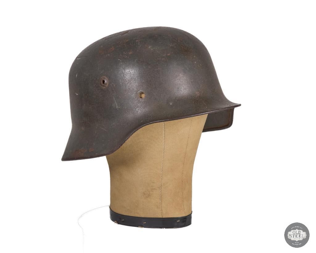Original M35 German Helmet Shell WWII: M35 German helmet shell. the four digit lot number is faded only showing 51?2. Makers mark is also faded with 64 being just visible. THIS ITEM IS AS PICTURED WITH NO FURTHER ATTACHMENTS.