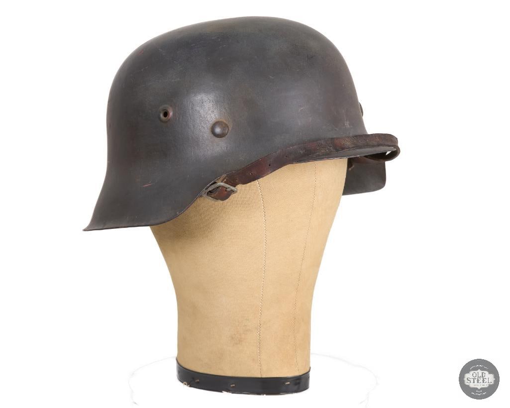 Original M42 German WWII Helmet: German WWII M42 helmet with liner and shell. Lot 5511 stamped on rear interior. No visible makers mark. THIS ITEM IS AS PICTURED WITH NO FURTHER ATTACHMENTS. ALL SALES ARE FINAL. PLEASE