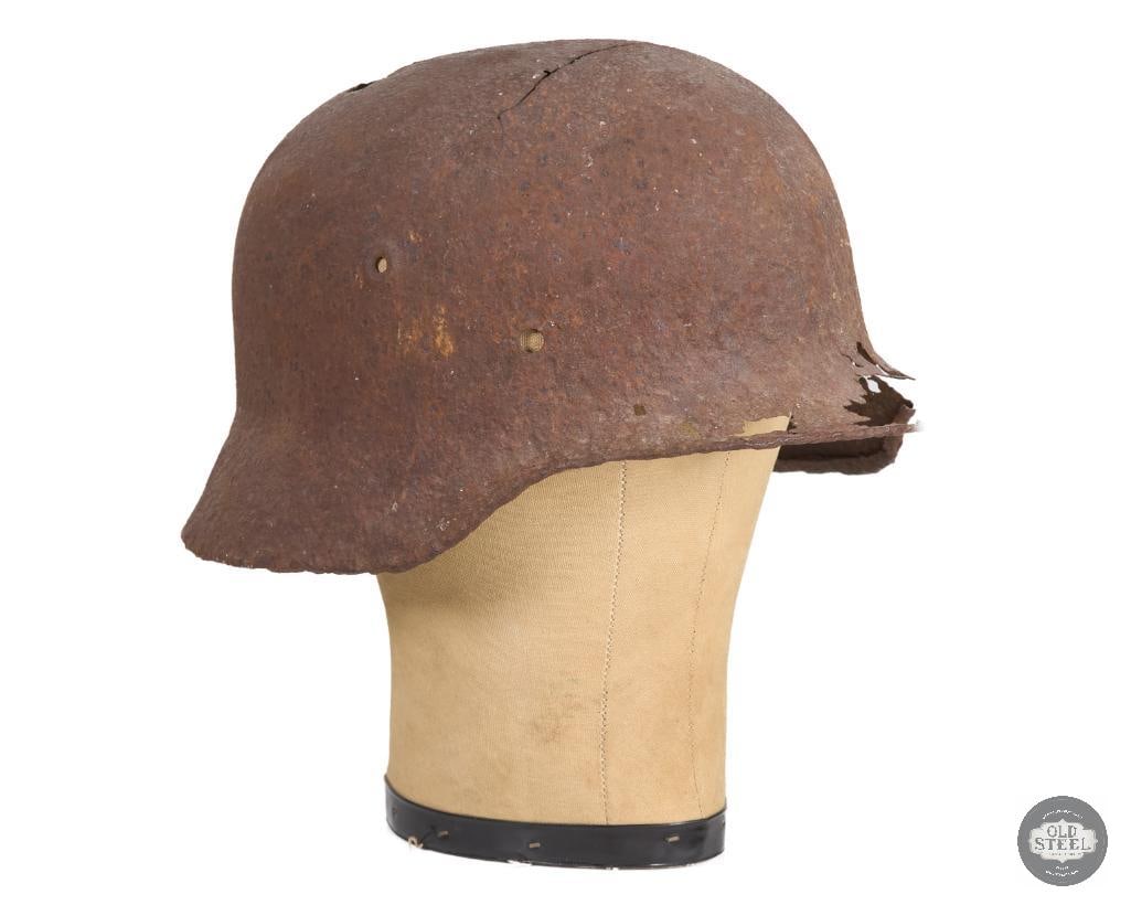 Battlefield Recovered M40 German Helmet Shell: Battlefield Recovered M40 German Helmet Shell THIS ITEM IS AS PICTURED WITH NO FURTHER ATTACHMENTS. ALL SALES ARE FINAL. PLEASE REFER TO THE AUCTION DESCRIPTION, LOT #1 DESCRIPTION AND