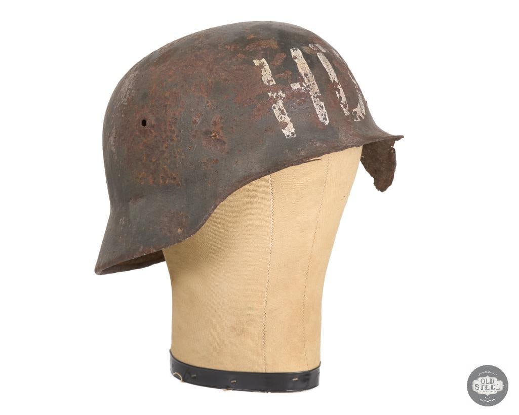 Original M40 German Battlefield Recovered Helmet Shell: Battlefield recovery M40 German helmet shell with still surviving green paint. THIS ITEM IS AS PICTURED WITH NO FURTHER ATTACHMENTS. ALL SALES ARE FINAL. PLEASE REFER TO THE AUCTION