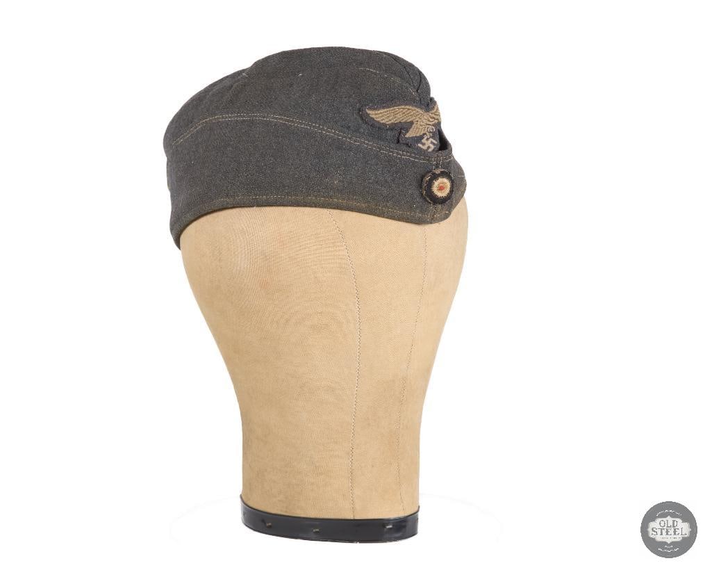 Original Luftwaffe Schiffchen Garrison Cap WWII German: Original Luftwaffe Schiffchen Garrison Cap WWII German THIS ITEM IS AS PICTURED WITH NO FURTHER ATTACHMENTS. ALL SALES ARE FINAL. PLEASE REFER TO THE AUCTION DESCRIPTION, LOT