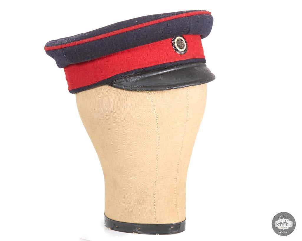 Original Imperial German Reserve Schirmmutze Service Cap WWI: Imperial German service cap with dark blue wool crown, red piping and red band. THIS ITEM IS AS PICTURED WITH NO FURTHER ATTACHMENTS. ALL SALES ARE FI