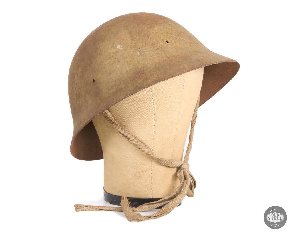 Original Japanese WWII Civil Defense Steel Helmet with Chinstrap - No Liner: Original Japanese WWII Civil Defense Steel Helmet with Chinstrap - No Liner THIS ITEM IS AS PICTURED WITH NO FURTHER ATTACHMENTS. ALL SALES ARE FINAL.