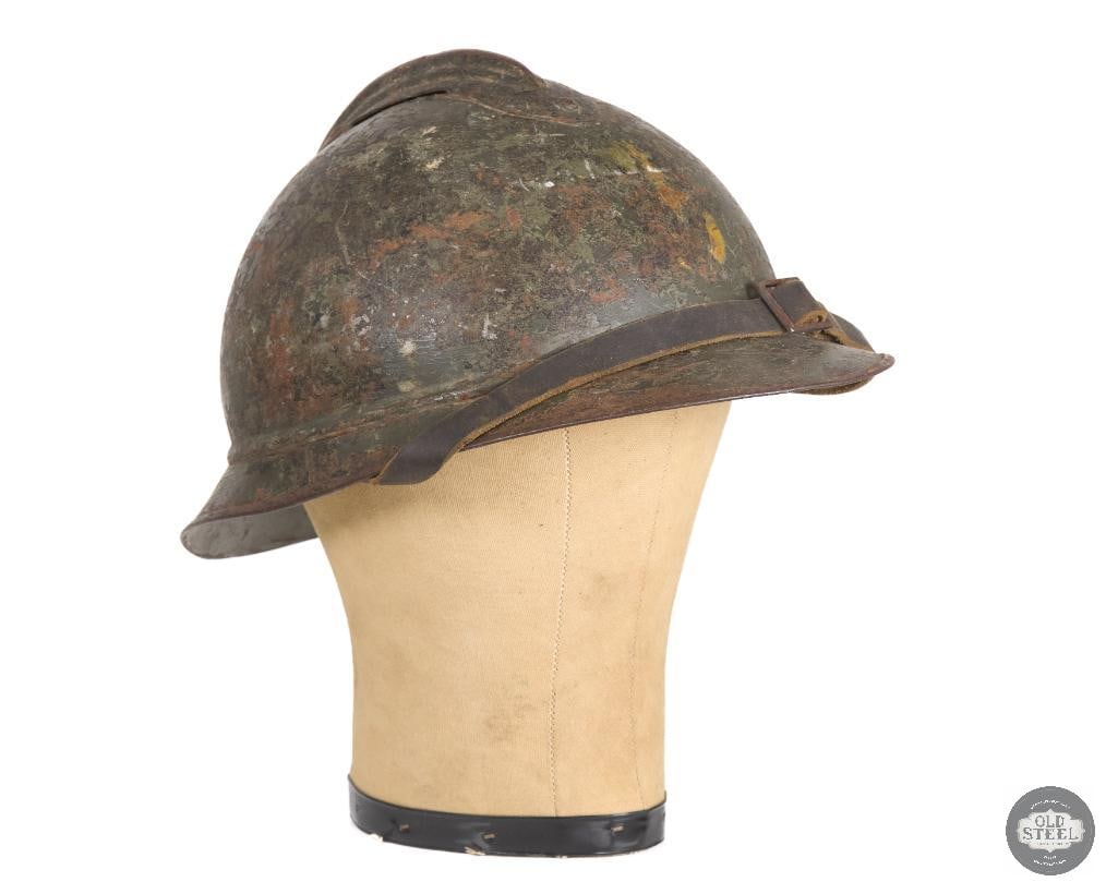 Original French Adrian Helmet with Chinstrap no Badge no Liner: Original French Adrian Helmet with Chinstrap no Badge no Liner THIS ITEM IS AS PICTURED WITH NO FURTHER ATTACHMENTS. ALL SALES ARE FINAL. PLEASE REFER TO THE AUCTION DESCRIPTION, LOT