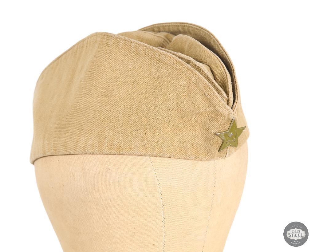 Soviet Pilotka Garrison Cap: Soviet Pilotka Garrison Cap THIS ITEM IS AS PICTURED WITH NO FURTHER ATTACHMENTS. ALL SALES ARE FINAL. PLEASE REFER TO THE AUCTION DESCRIPTION, LOT #1 DESCRIPTION AND TERMS OF SALE BEFORE
