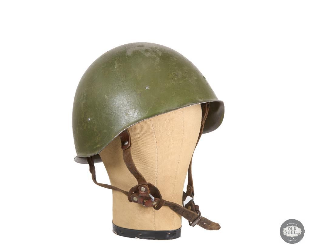 Soviet SSH40 Steel Helmet with East German Style Leather Chinstrap: Soviet SSH40 Steel Helmet with East German Style Leather Chinstrap THIS ITEM IS AS PICTURED WITH NO FURTHER ATTACHMENTS. ALL SALES ARE FINAL. PLEASE R