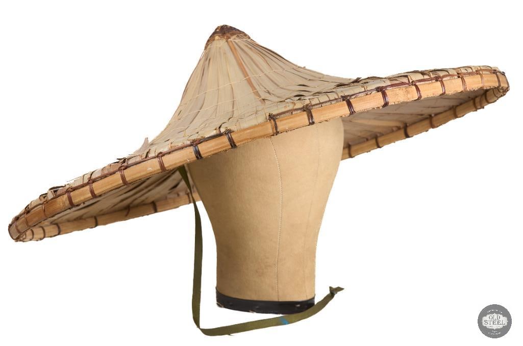 Traditional Vietnamese Conical Bamboo/Reed/Grass 'Coolie' Sun Hat: Tradition Vietnamese Conical Bamboo/Reed/Grass 'Coolie' Sun Hat THIS ITEM IS AS PICTURED WITH NO FURTHER ATTACHMENTS. ALL SALES ARE FINAL. PLEASE REFER TO THE AUCTION DESCRIPTION, LOT