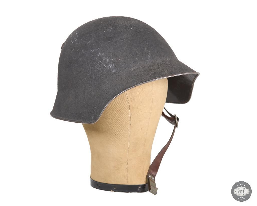Swiss M18/43 Matte Sawdust Black Helmet: Swiss M18/43 Matte Sawdust Black Helmet THIS ITEM IS AS PICTURED WITH NO FURTHER ATTACHMENTS. ALL SALES ARE FINAL. PLEASE REFER TO THE AUCTION DESCRIPTION, LOT #1 DESCRIPTION AND TERMS OF