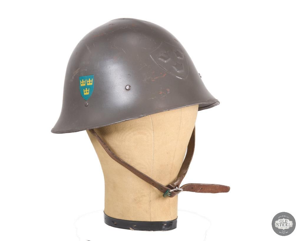 Swedish M26 Helmet: Swedish M26 Helmet THIS ITEM IS AS PICTURED WITH NO FURTHER ATTACHMENTS. ALL SALES ARE FINAL. PLEASE REFER TO THE AUCTION DESCRIPTION, LOT #1 DESCRIPTION AND TERMS OF SALE BEFORE BIDDING.