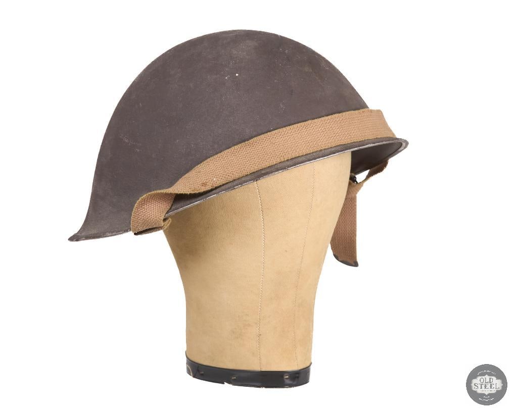 British Mk IV Helmet 1945 WWII: British Mk IV Helmet. Shell is marked BMB 1945 B06 MK III on shell interior. THIS ITEM IS AS PICTURED WITH NO FURTHER ATTACHMENTS. ALL SALES ARE FINAL. PLEASE REFER TO THE AUCTION