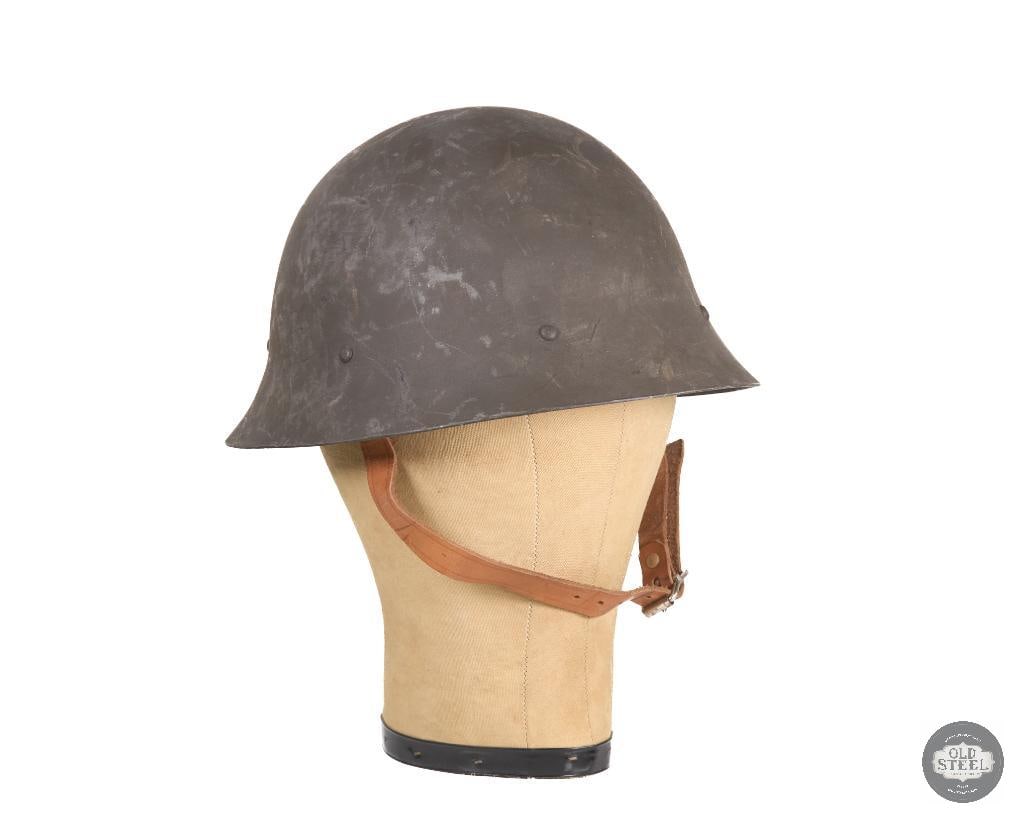 Swedish M26 Helmet: Swedish M26 Helmet. Good leather of the liner and chinstrap. Inside of shell marked in ink with a crowned L.I. 66 THIS ITEM IS AS PICTURED WITH NO FUR