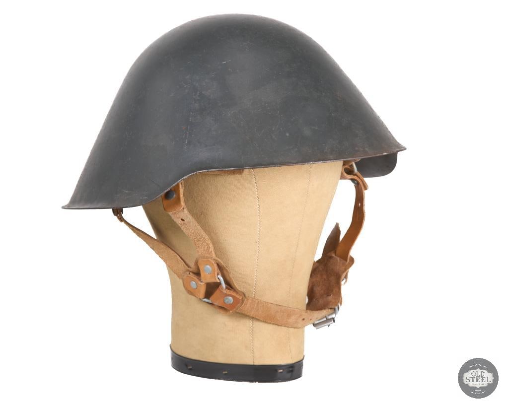 East German NVA M56/76 Steel Helmet: Cold War era East German National Peoples Army M56/76 helmet. THIS ITEM IS AS PICTURED WITH NO FURTHER ATTACHMENTS. ALL SALES ARE FINAL. PLEASE REFER TO THE AUCTION DESCRIPTION, LOT