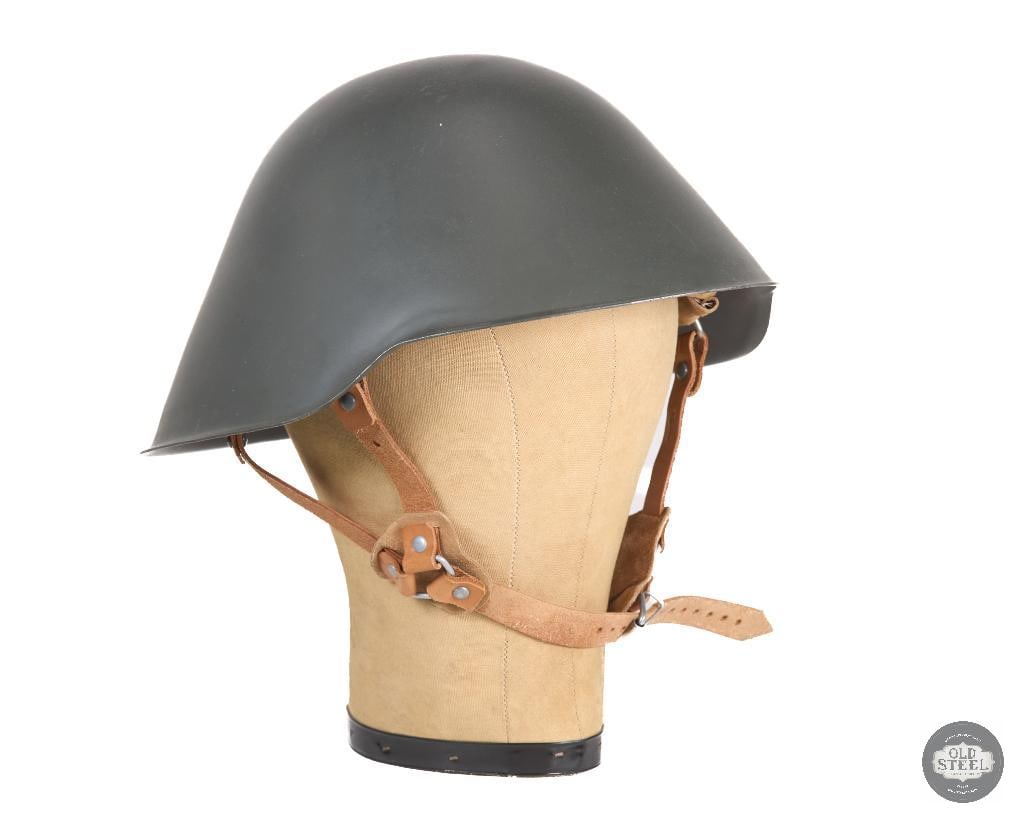 East German M56/76 Helmet: East German M56/76 Helmet THIS ITEM IS AS PICTURED WITH NO FURTHER ATTACHMENTS. ALL SALES ARE FINAL. PLEASE REFER TO THE AUCTION DESCRIPTION, LOT #1 DESCRIPTION AND TERMS OF SALE BEFORE