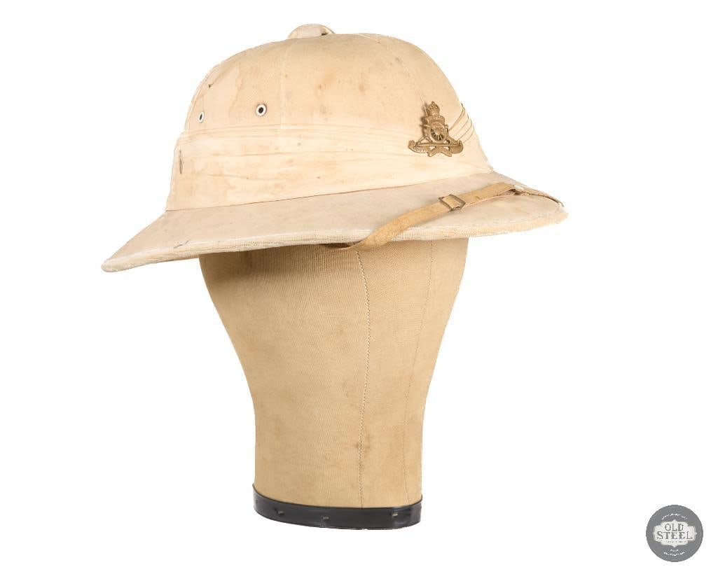 British WWII 5th Searchlight Regiment Royal Artillery Pith Sun Hat: This pith helmet is from the short lived 5th Searchlight Regiment of the Royal Artillery during WWII set up to defend Singapore in 1941. They were captured in less than a year after surrendering to