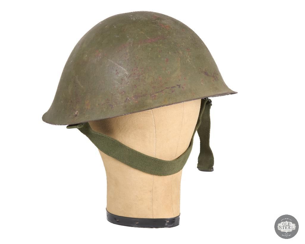 British MKIV Helmet with 1980s Liner and Elastic Chinstrap: British MKIV Helmet with 1980s Liner and Elastic Chinstrap THIS ITEM IS AS PICTURED WITH NO FURTHER ATTACHMENTS. ALL SALES ARE FINAL. PLEASE REFER TO THE AUCTION DESCRIPTION, LOT
