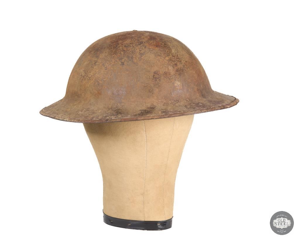 British MK I Brodie WWI Helmet Shell: British MK I Brodie WWI Helmet Shell. Liner is heavily degraded. THIS ITEM IS AS PICTURED WITH NO FURTHER ATTACHMENTS. ALL SALES ARE FINAL. PLEASE REFER TO THE AUCTION DESCRIPTION, LOT