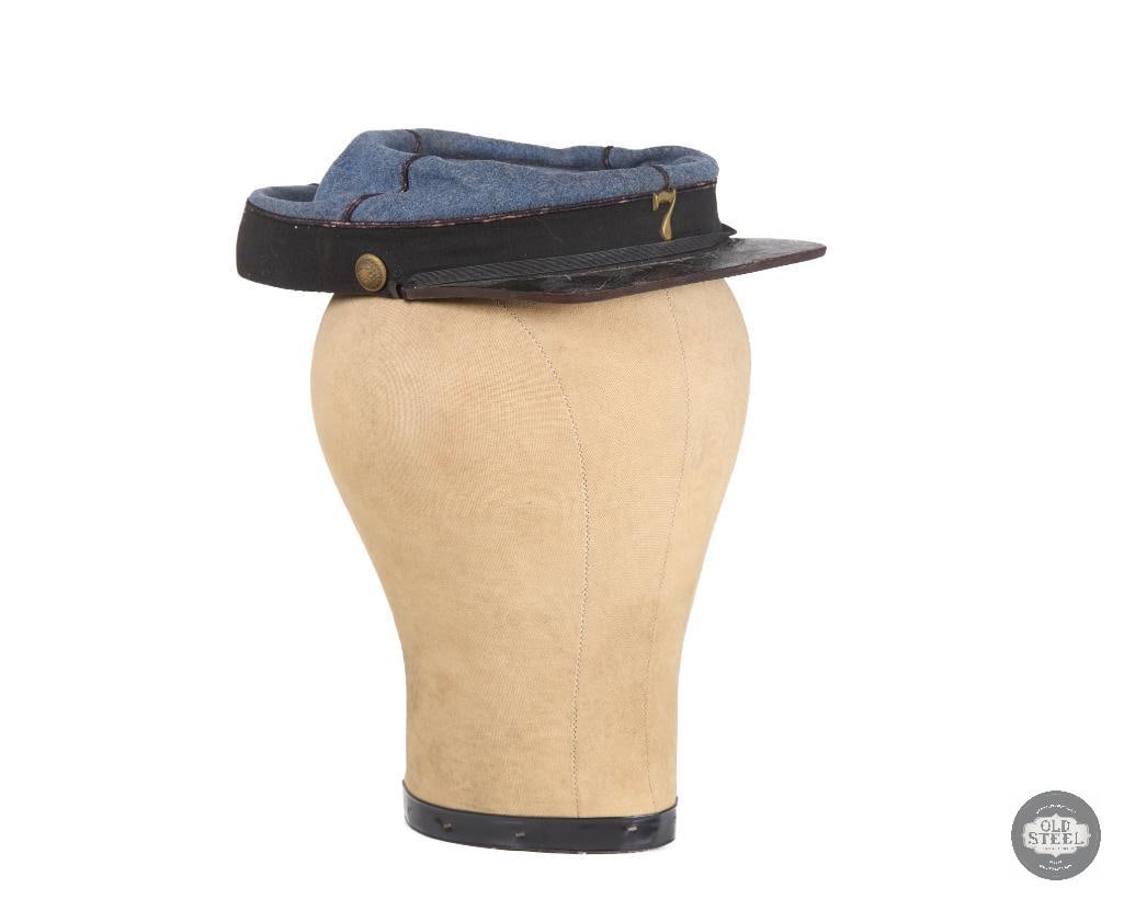 Original US Civil War New York 7th Regiment Kepi Cap: Original US Civil War New York 7th Regiment Kepi Cap. Remnants of newspaper cutouts on underside of brim and other papers on inside. THIS ITEM IS AS
