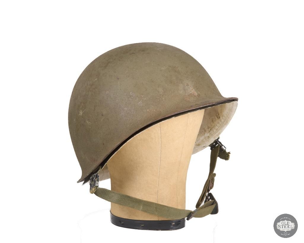 US M1 Helmet: Here we have a US M1 steel helmet with a blank liner that has been painted white on the inside. No holes or brackets present, complete smooth. THIS ITEM IS AS PICTURED WITH NO FURTHER