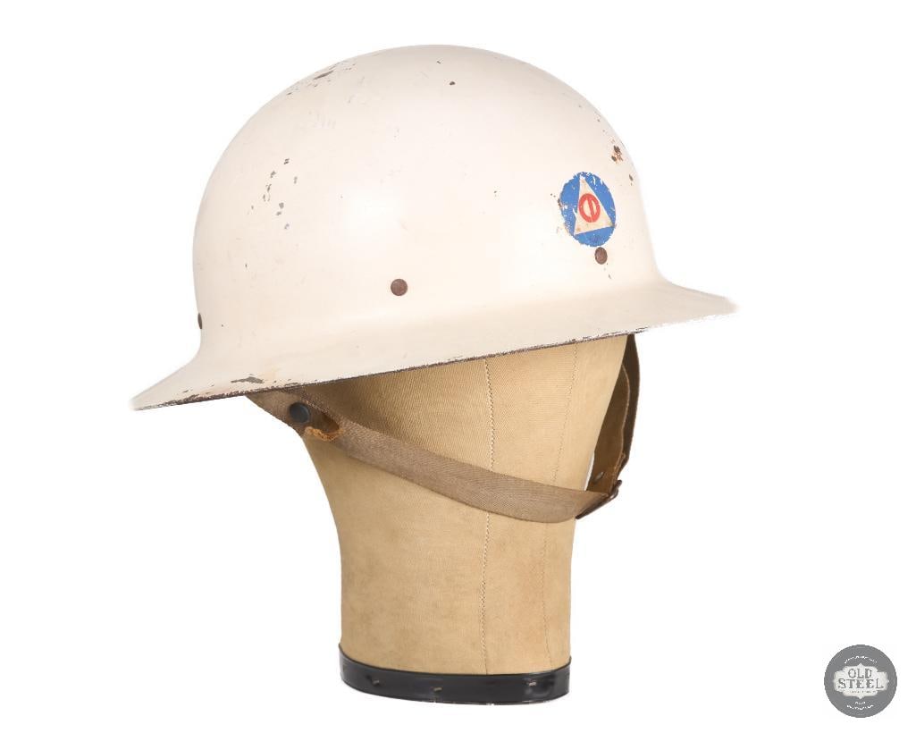 US Civil Defense Steel Helmet - WWII: A steel US Civil Defense helmet. No sticker but the stamped Mc on the underside of the brim implies B.F.McDonald Co Make. Written in pencil by the user is: Deputy Sector Commander R. Bramley