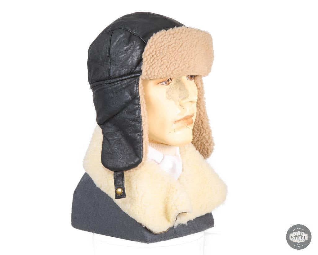 Display Bust with Faux Bomber Flight Helmet and Jacket: Here we have a display bust with a faux modern day polyester shearling style bomber flight helmet and mock jacket. Great for displays, fits large and medium caps. Excellent display tool. THIS
