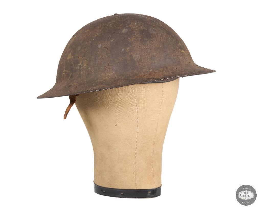 British Mk I Brodie Helmet WWI: British Mk I Brodie Helmet WWI marked D/F 85 THIS ITEM IS AS PICTURED WITH NO FURTHER ATTACHMENTS. ALL SALES ARE FINAL. PLEASE REFER TO THE AUCTION DESCRIPTION, LOT #1 DESCRIPTION AND