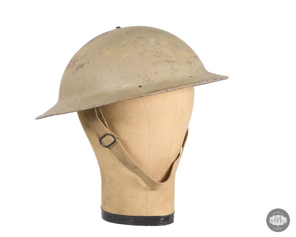 British Mk II South African Theater Helmet WWII with Neck Cover Mounting Holes on Brim: British Mk II South African Theater Helmet WWII with Neck Cover Mounting Holes on Brim THIS ITEM IS AS PICTURED WITH NO FURTHER ATTACHMENTS. ALL SALES ARE FINAL. PLEASE REFER TO THE AUCTION