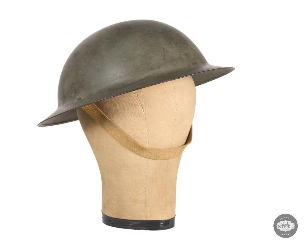 British Mk II Brodie Helmet WWII: British Mk II Brodie Helmet WWII THIS ITEM IS AS PICTURED WITH NO FURTHER ATTACHMENTS. ALL SALES ARE FINAL. PLEASE REFER TO THE AUCTION DESCRIPTION, LOT #1 DESCRIPTION AND TERMS OF SALE