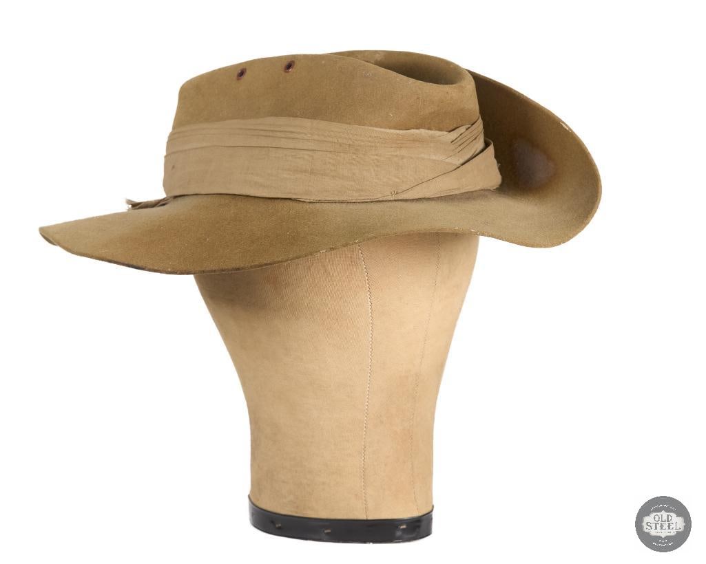 British Commonwealth Forces Slouch Hat - Formation Flash of Headquarters Land Forces Hong Kong WWII: WWII slouch hat with a Headquarters Land Forces of Hong Kong flash on the side. THIS ITEM IS AS PICTURED WITH NO FURTHER ATTACHMENTS. ALL SALES ARE FINAL. PLEASE REFER TO THE AUCTION