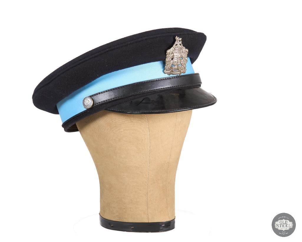 British King Edwards Horse Badge and Buttons on Visor Cap: This appears to be a custom peice utilizing a wool visor cap and a King Edwards Horse badge and buttons. No examples could be found that even remotely resemble this piece. 