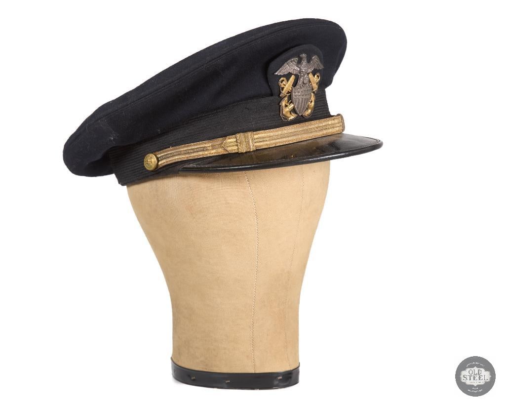 US Naval Officer's Visor Cap WWII: US Naval Officer's Visor Cap WWII THIS ITEM IS AS PICTURED WITH NO FURTHER ATTACHMENTS. ALL SALES ARE FINAL. PLEASE REFER TO THE AUCTION DESCRIPTION, LOT #1 DESCRIPTION AND TERMS OF SALE