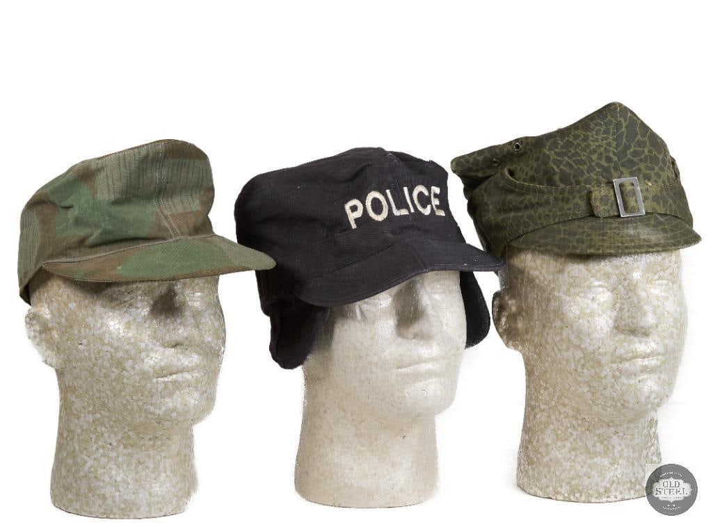 Mixed Lot of Military Style Caps: US BDU Uniform style black ear flap hat with POLICE embroidery Reproduction WWII German Splinter camo hat Polish Wz.89 Puma Pattern cap Nov. 1989 
