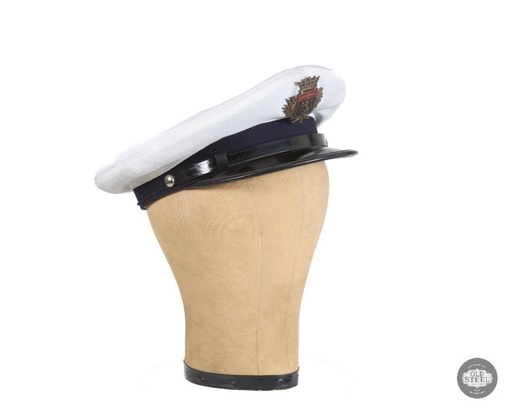 Heraldic Lion Crest Badge on Size 56 Visor Cap: Heraldic Lion Crest Badge on Size 56 Visor Cap THIS ITEM IS AS PICTURED WITH NO FURTHER ATTACHMENTS. ALL SALES ARE FINAL. PLEASE REFER TO THE AUCTION DESCRIPTION, LOT #1 DESCRIPTION AND