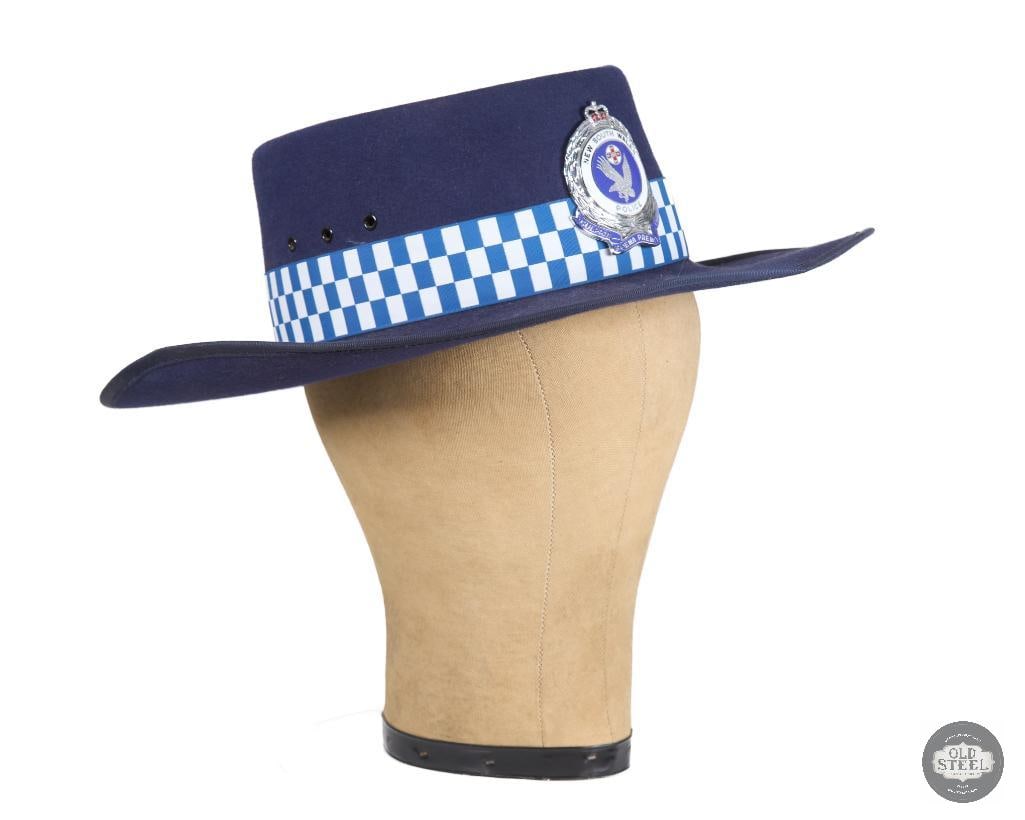 New South Wales Police Force Akubra Hat: New South Wales Police Force Akubra Hat THIS ITEM IS AS PICTURED WITH NO FURTHER ATTACHMENTS. ALL SALES ARE FINAL. PLEASE REFER TO THE AUCTION DESCRIPTION, LOT #1 DESCRIPTION AND TERMS OF