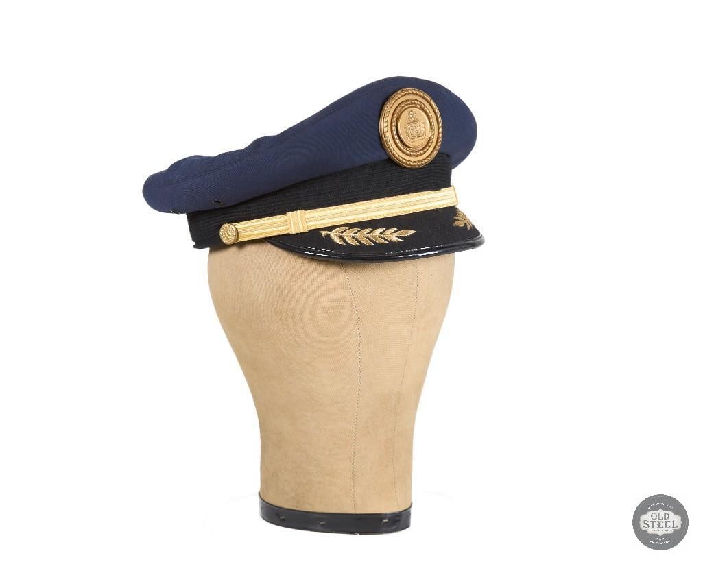 Visor Cap with Embroidery and Heavy Medallion Cap Badge: Visor Cap with Embroidery and Heavy Medallion Cap Badge THIS ITEM IS AS PICTURED WITH NO FURTHER ATTACHMENTS. ALL SALES ARE FINAL. PLEASE REFER TO THE AUCTION DESCRIPTION, LOT