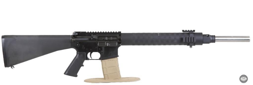 Field-Ready Bushmaster XM15-E2S 20" Bull Barrel AR15 Free Float Tube Precision Rifle: Up for auction is a Bushmaster XM15-E2S chambered in 5.56 NATO. This rifle features a heavy 20-inch bull barrel and was configured with precision shooting in mind, offering excellent stability and