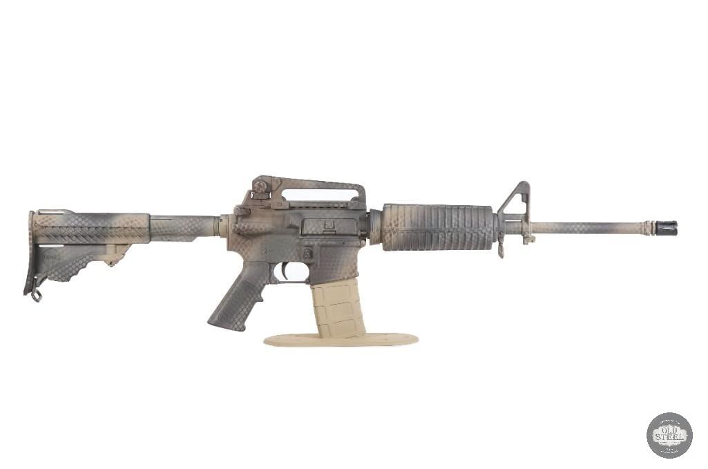 Battle-Ready AR15 5.56 NATO 16" Rifle Desert Camo Detachable Carry Handle: Up for auction is a custom AR-15 chambered in 5.56 NATO. Featuring a versatile 16-inch barrel and a distinctive desert camouflage finish, this rifle delivers both practical performance and