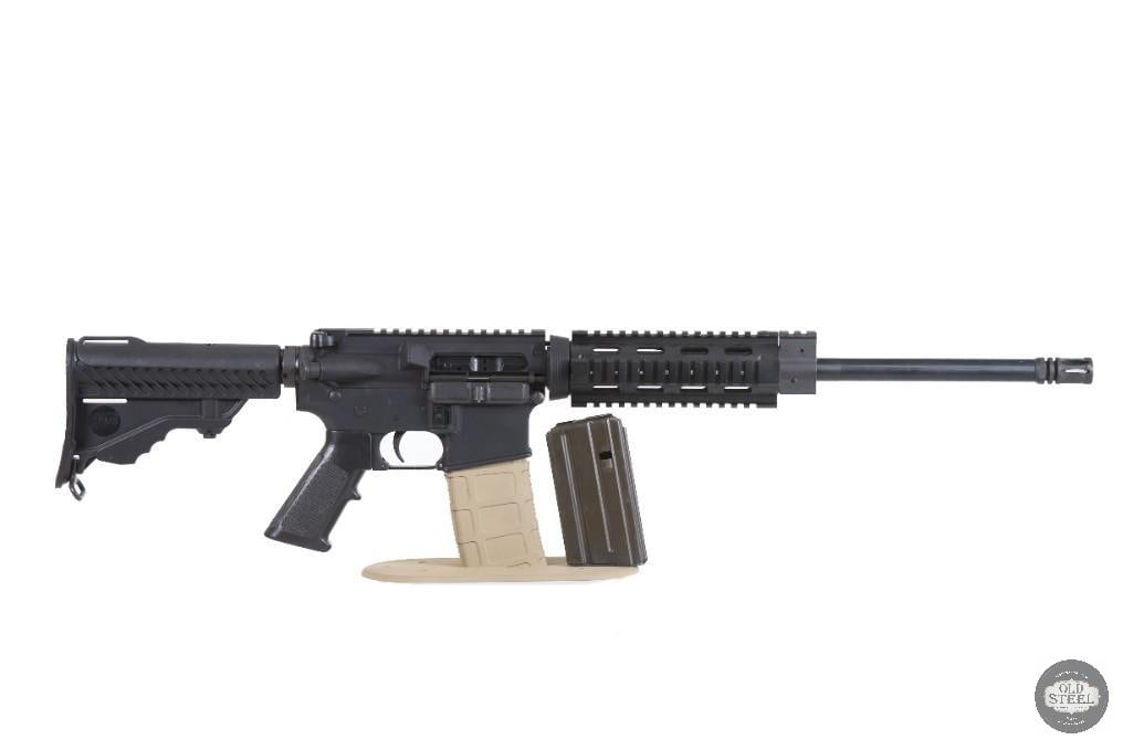 Beautiful AR15 5.56 NATO 16" Quad Rail Carbine Adjustable Stock Rifle: Up for auction is a custom AR-15 chambered in 5.56 NATO. Featuring a versatile 16-inch barrel and a proven carbine-length gas system, this rifle delivers the reliability, handling, and performance