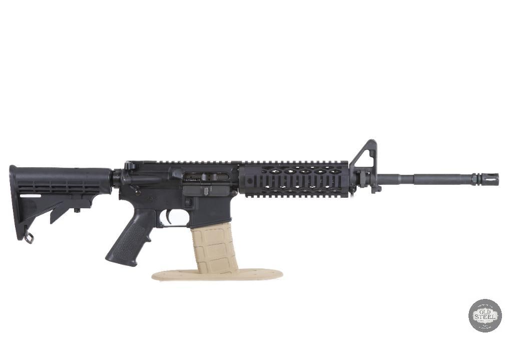 Beautiful AR15 5.56 NATO 16" Government Barrel YHM Free Float Quad Rail Rifle: Up for auction is a custom AR-15 chambered in 5.56 NATO. Featuring a 16-inch government profile barrel, this rifle offers the balance, reliability, and versatility that have made the AR-15 America's