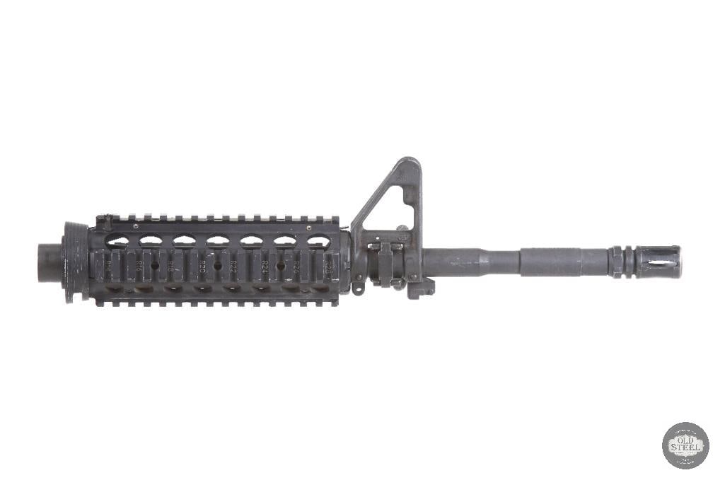 Military Surplus 14.5" SOCOM Profile Barrel Assembly KAC Quad Rail FSP: Up for auction is a military surplus AR-15 barrel assembly featuring a 14.5-inch SOCOM profile barrel, front sight post, and Knight's Armament Company (KAC) quad rail. This is a highly desirable confi