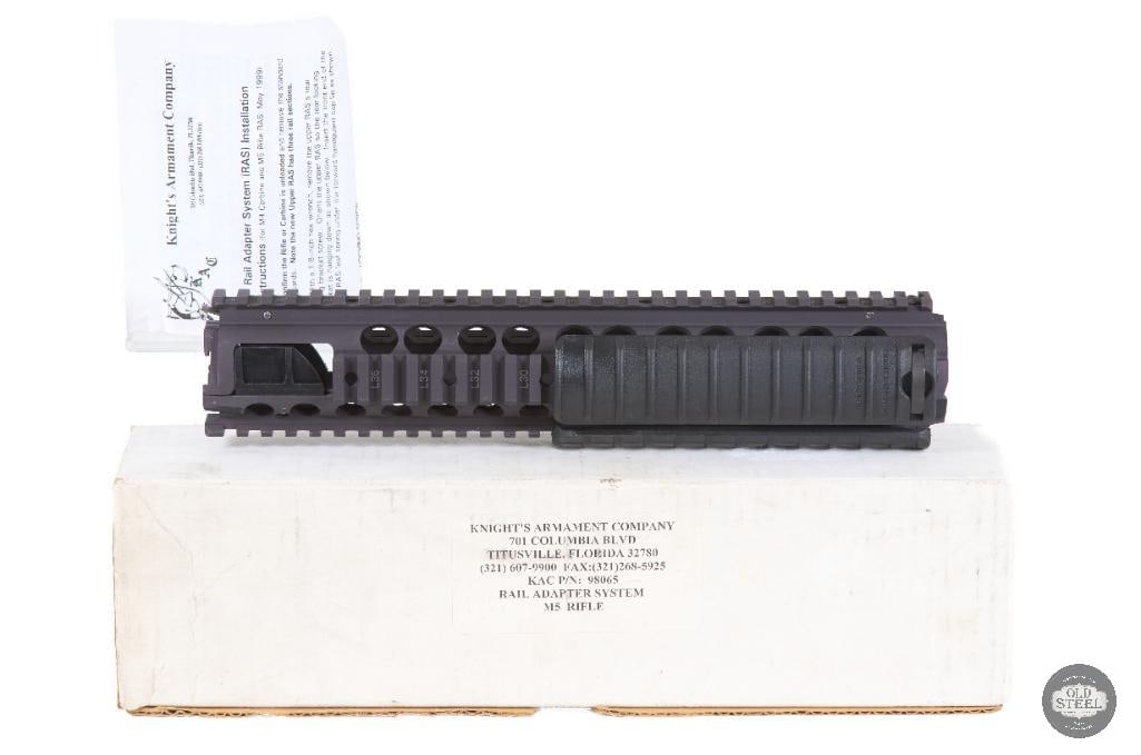 NIB Knights Armament KAC M16A4 Quad Rail Handguard USGI Style: Up for auction is a New In Box Knights Armament Company (KAC) M16A4 quad rail handguard. Designed to replicate the iconic military-issued rail system used on M16A4 service rifles, this is a highly
