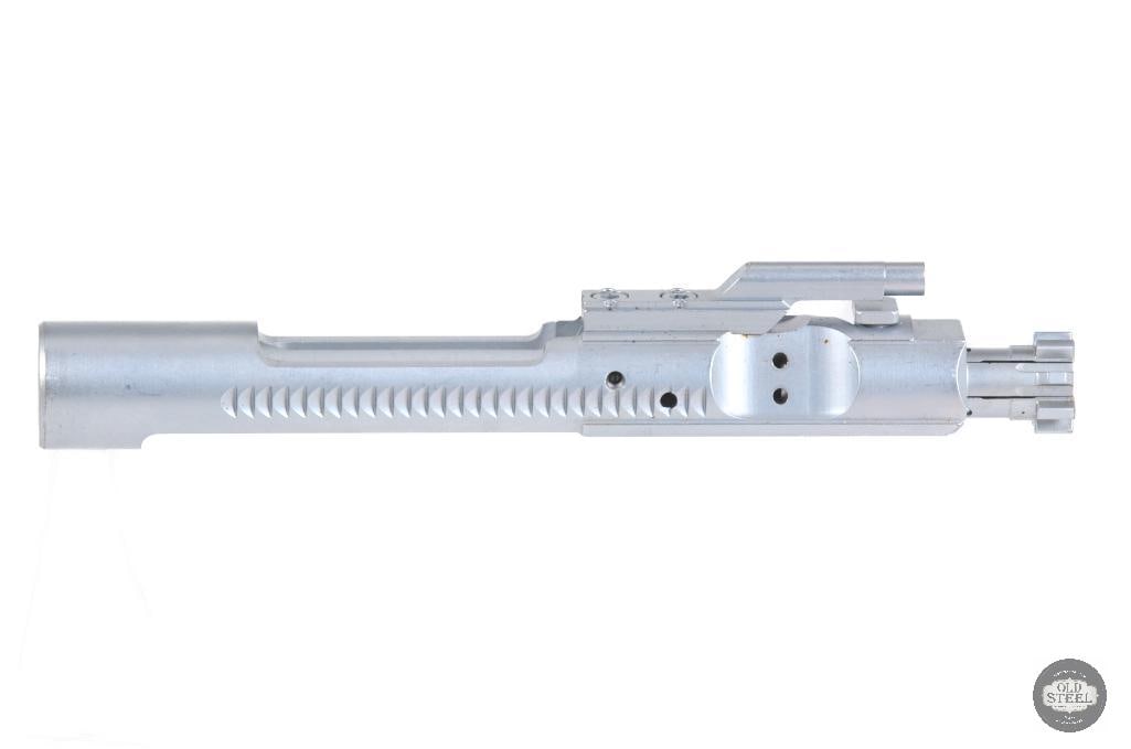 Chrome AR15 Bolt Carrier Group 5.56 NATO .223 (New): This chrome-finished AR15 bolt carrier group is built for 5.56 NATO and .223 Remington platforms, offering a smooth, highly polished carrier surface for reliable cycling and easy maintenance.