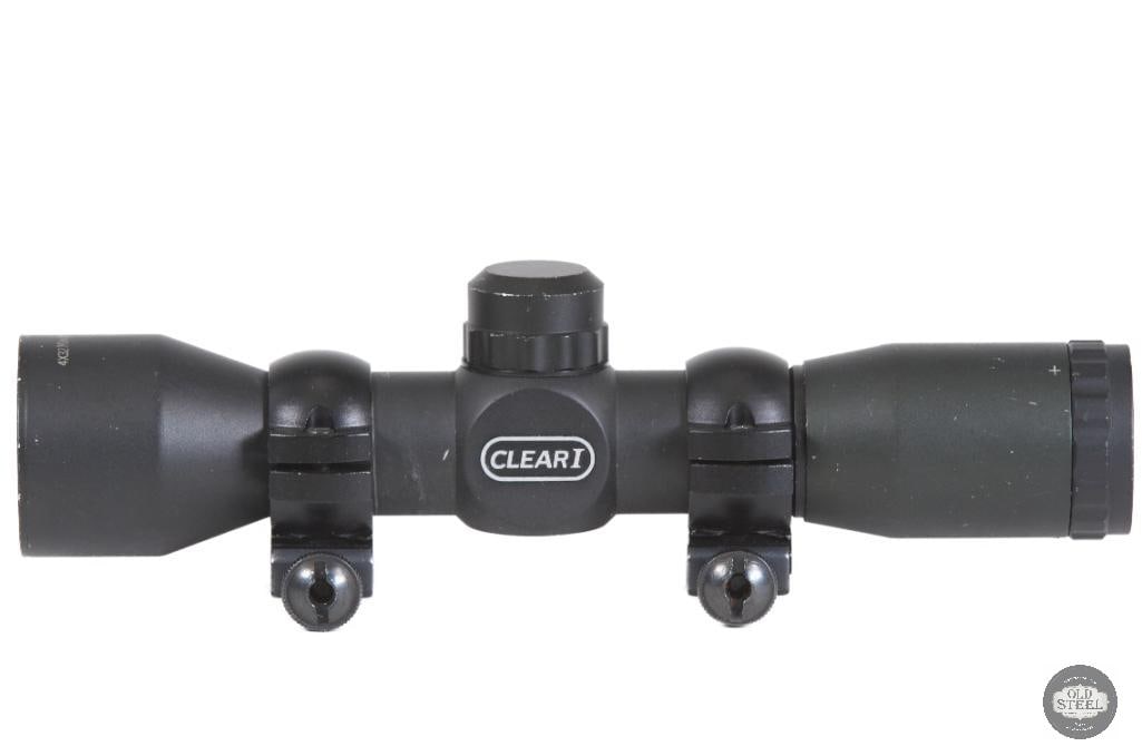 1-4x32 Rifle Scope Mil-Dot Reticle Optic: This 1-4x32 rifle scope is a compact variable-power optic designed for close to mid-range shooting applications. Featuring adjustable magnification from 1x to 4x and a 32mm objective lens, it