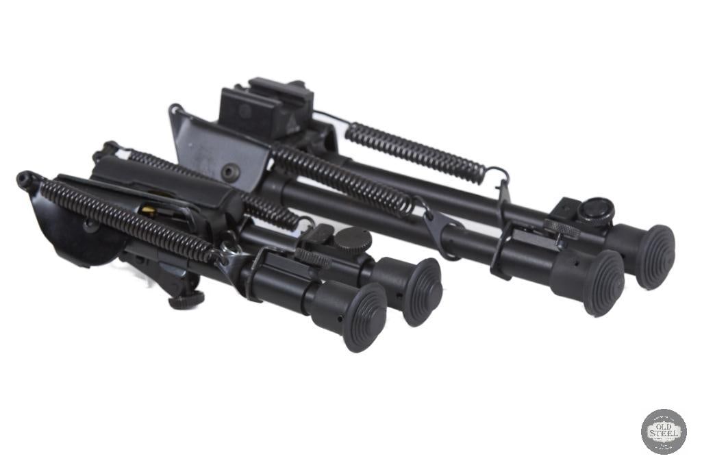Lot of 2 Harris-Style Rifle Bipods Black: This lot includes two black Harris-style rifle bipods designed to provide a stable shooting platform for rifles used in precision shooting, hunting, and general range applications. Featuring the