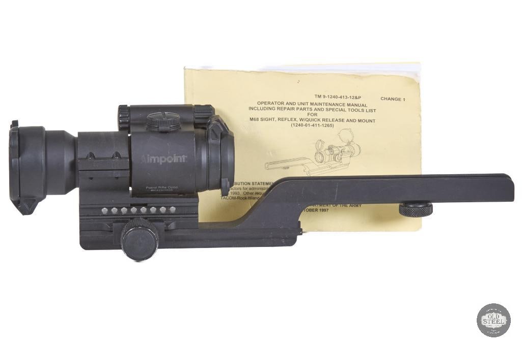 Aimpoint PRO Red Dot Sight with Carry Handle Gooseneck Mount & Manual: This Aimpoint PRO (Patrol Rifle Optic) is a durable, duty-grade red dot sight designed for fast target acquisition and reliable performance on AR-platform rifles. Featuring a clear 2 MOA red dot, it