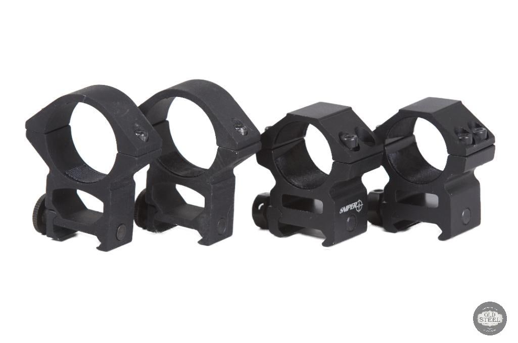 Lot of 2 Scope Ring Sets 1 and 30mm: This lot includes two scope ring sets designed for mounting rifle optics to standard Picatinny or compatible rail systems. One set is configured for 1-inch scope tubes, while the second set accommodat
