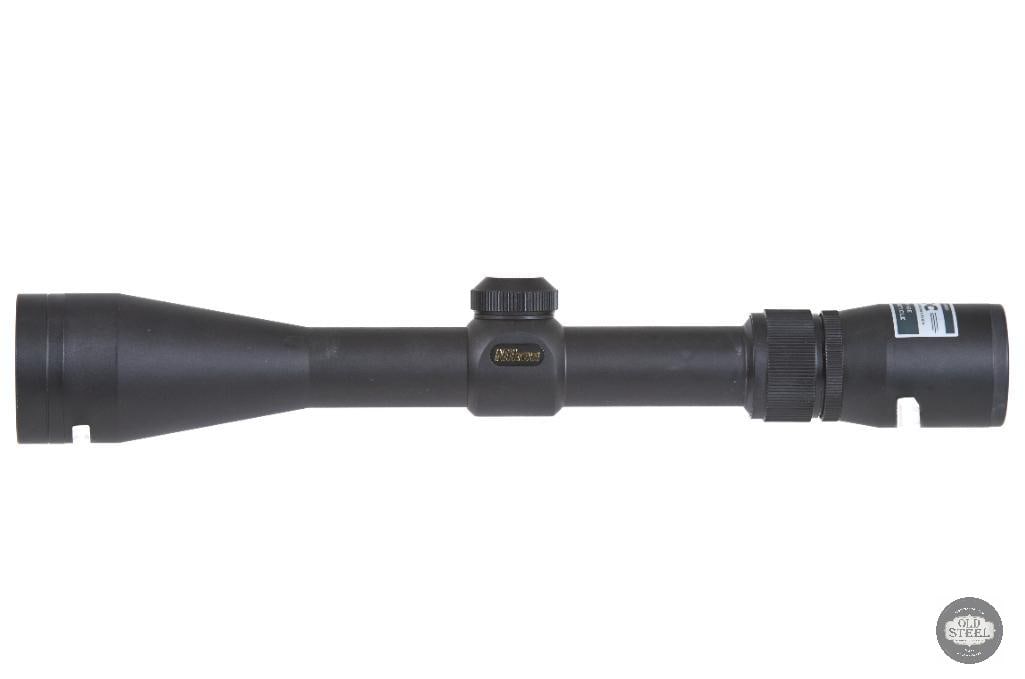Nikon SA 39x40 Rifle Scope Variable Power Optic: This Nikon SA 39x40 rifle scope is a versatile variable-power optic designed for hunting and general-purpose shooting applications. Featuring adjustable magnification from 3x to 9x and a 40mm