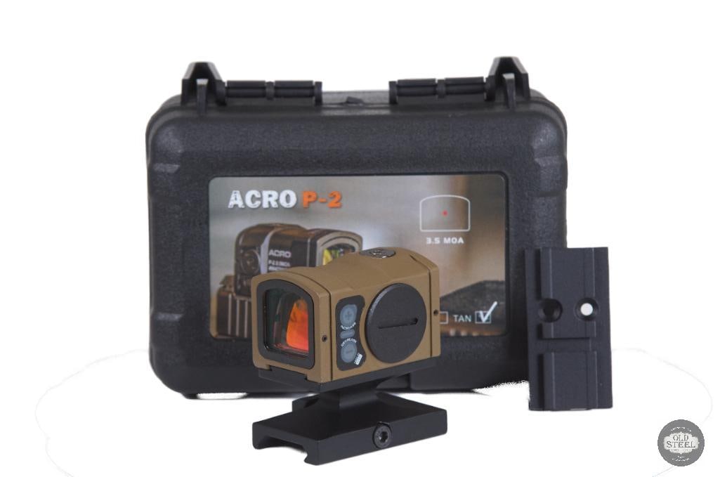 FDE Acro P-2 Style Enclosed Red Dot Sight Training Optic: This FDE Acro P-2 style enclosed red dot sight is a high-quality replica designed to closely replicate the appearance and form factor of the popular enclosed-emitter optic. Finished in Flat Dark Earth
