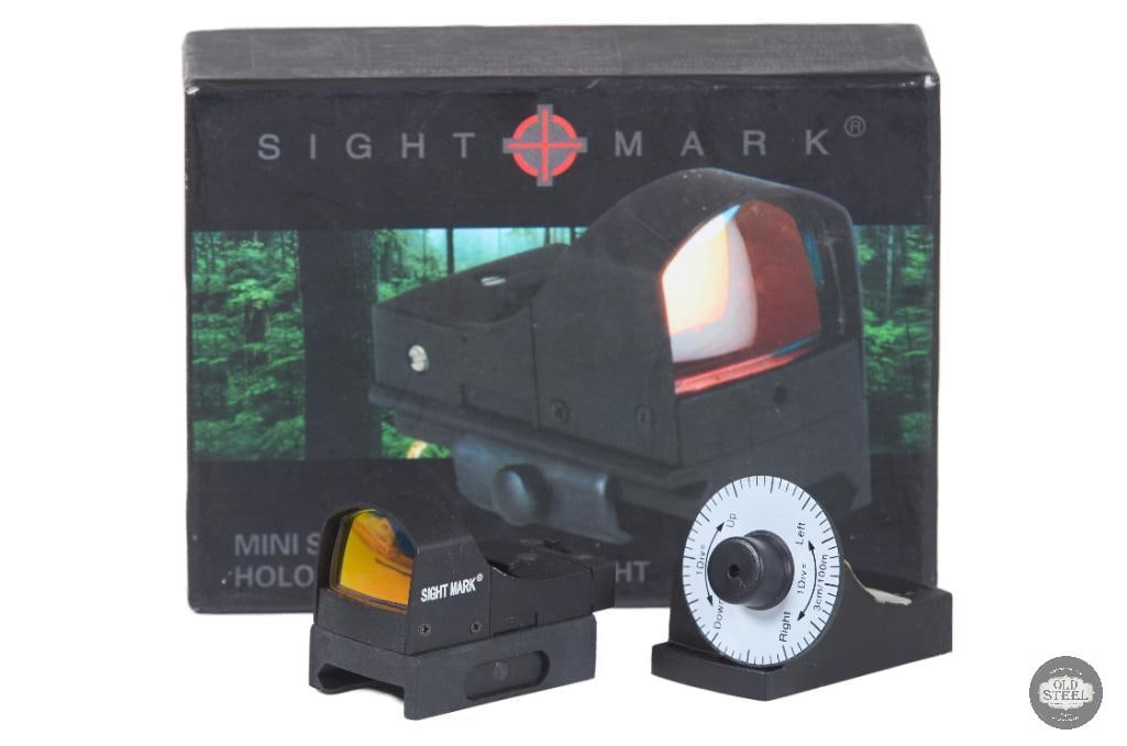 Sightmark Micro Red Dot Sight Compact Reflex Optic with Box: This Sightmark micro red dot sight is a compact reflex optic designed for fast target acquisition and versatile use across a variety of firearm platforms. Featuring a lightweight, low-profile design,