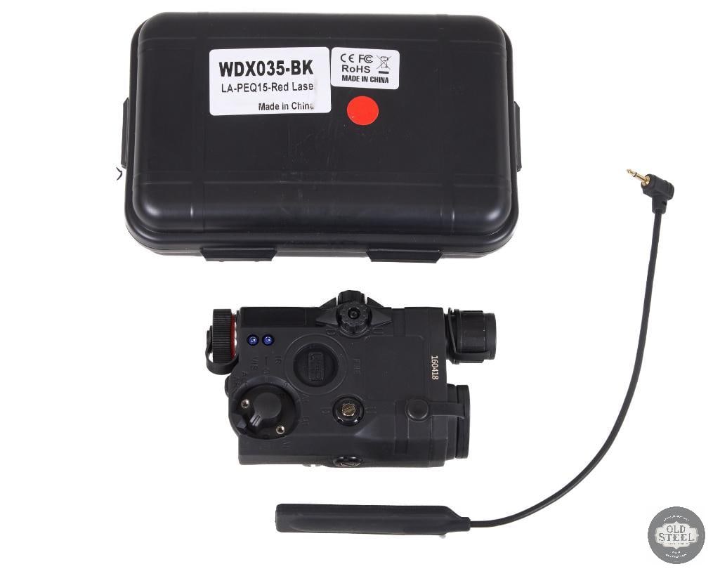 PEQ-15 Style Tactical Laser Module Black with Pressure Pad: This PEQ-15 style laser aiming module is a compact rail-mounted unit designed in the form factor of the widely recognized military-style aiming device. Finished in black, it mounts to standard